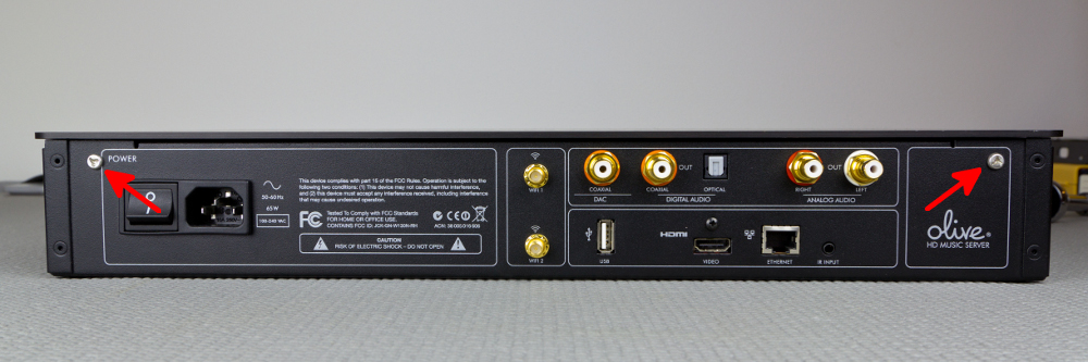 The back of the Olive O4HD player showing the two tri-wing screws that must be removed.